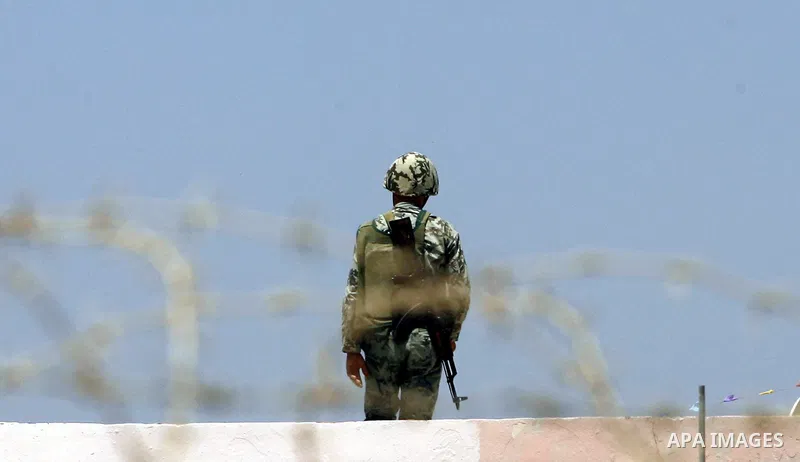 Egyptian soldiers stand guard on the border between Egypt and the southern Gaza Strip, near Rafah August 6, 2012. Egypt has closed the terminal, the only gateway for Gaza's people after the deadly attack on its soldiers...