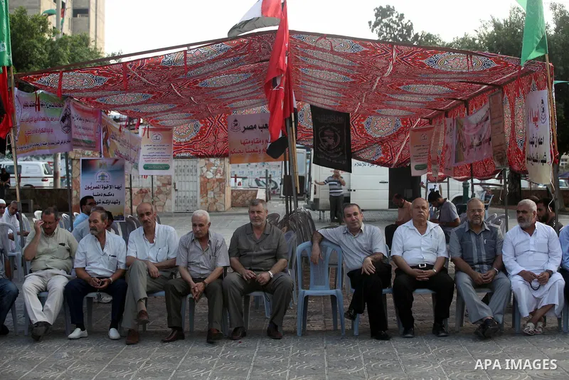 Palestinian Prime Minister in Gaza Strip, Ismail Haniyeh visits the mourning tent of the Egyptian soldiers who were killed on on Rafah border between Egypt and the southern Gaza Strip, on 06 August 2012. Egypt has closed...