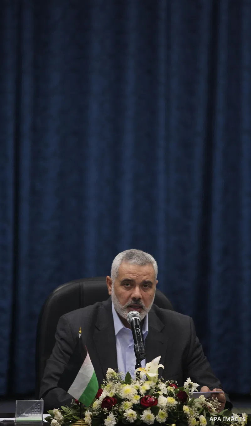 Palestinian Prime Minister in Gaza Ismail Haniyeh chairs a Ministerial meeting to consult in the last events on Rafah border between Egypt and the southern Gaza Strip, on 06 August 2012. Egypt has closed the terminal, th...
