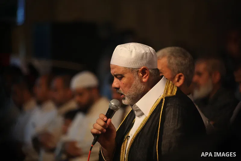 Palestinian Prime Minister in Gaza Ismail Haniyeh leads a night prayer known as "Tarawih" at a sit-in tent in Gaza city, solidarity with Egyptian soldiers who were killed on Rafah border between Egypt and the southern Ga...