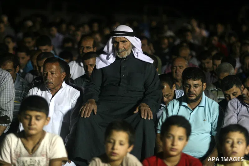 Palestinian Muslims perform a night prayer known as "Tarawih" at the mosque in the West Bank city of Ramallah on Aug. 07, 2012. Photo by Issam Rimawi