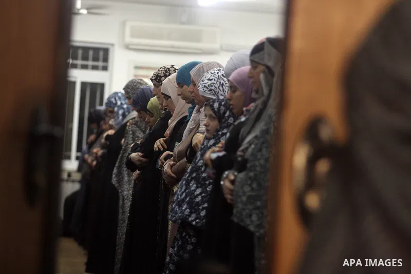Palestinian Muslims perform a night prayer known as "Tarawih" at the mosque in the West Bank city of Ramallah on Aug. 07, 2012. Photo by Issam Rimawi