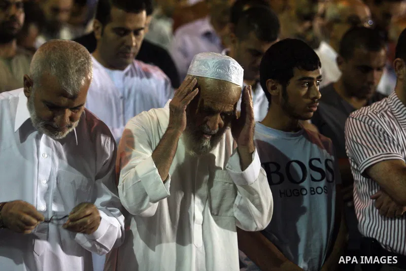 Palestinian Muslims perform a night prayer known as "Tarawih" at the mosque in the West Bank city of Ramallah on Aug. 07, 2012. Photo by Issam Rimawi