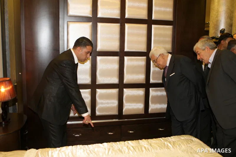 Palestinian President, Mahmoud Abbas (Abu Mazen), inspects a factory in the West Bank city of Nablus on, Aug. 07, 2012. Photo by Thaer Ganaim