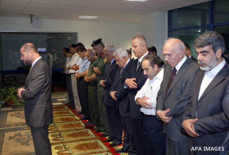 Palestinian President, Mahmoud Abbas (Abu Mazen) prays Al Maghrib , in the West Bank city of Nablus on, Aug. 07, 2012. Photo by Thaer Ganaim