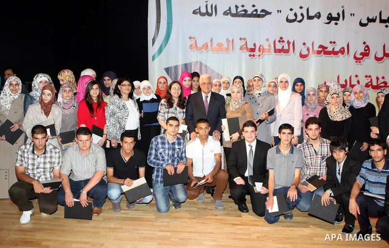 Palestinian President, Mahmoud Abbas (Abu Mazen) participates ceremony honoring high school students, in the West Bank city of Nablus on, Aug. 07, 2012. Photo by Thaer Ganaim