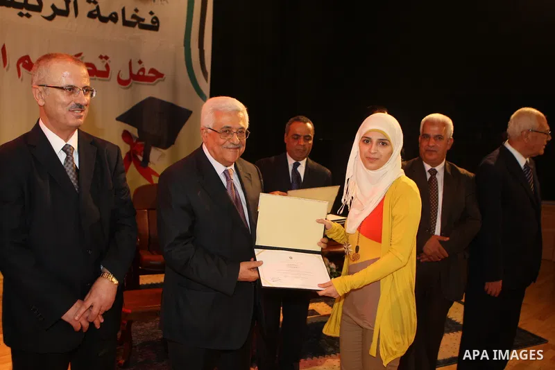 Palestinian President, Mahmoud Abbas (Abu Mazen) participates ceremony honoring high school students, in the West Bank city of Nablus on, Aug. 07, 2012. Photo by Thaer Ganaim