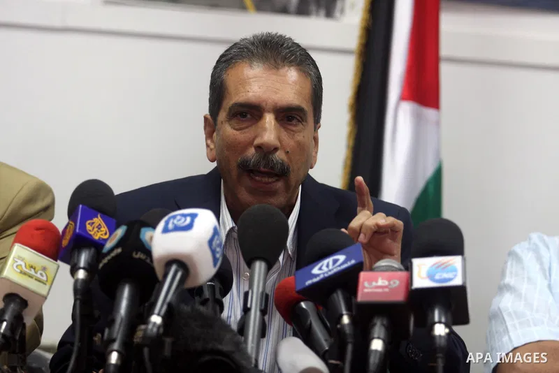 Palestinian Tawfik Terawi, speaks during a press conference in the West Bank city of Ramallah, Wednesday, Aug. 8, 2012. Tirawi said Wednesday Palestinian officials have invited Swiss experts to test the leader's Arafat f...