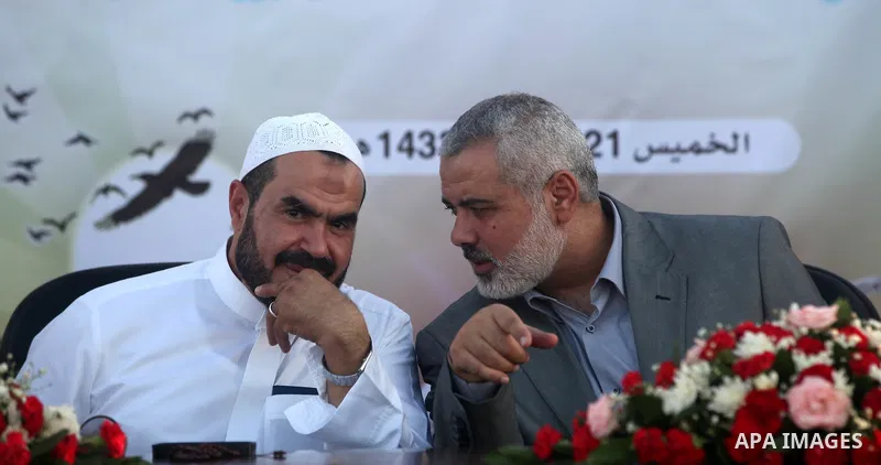 Palestinian Prime Minister in Gaza Strip, Ismail Haniyeh, breaks his fast with a Palestinian released Prisoners during the holy month of Ramadan, in Gaza city on 09 August 2012. Photo by Majdi Fathi