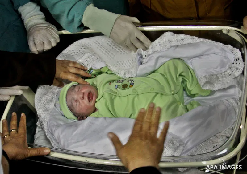 Palestinian Dalal Al Zabin gives birth by IVF , wife of Palestinian Prisoners Ammar Al Zabin, who doomed him 27 Life imprisonment and 25 years held in Israeli jails since 1998, in the West Bank city of Nablus, on Aug. 13...