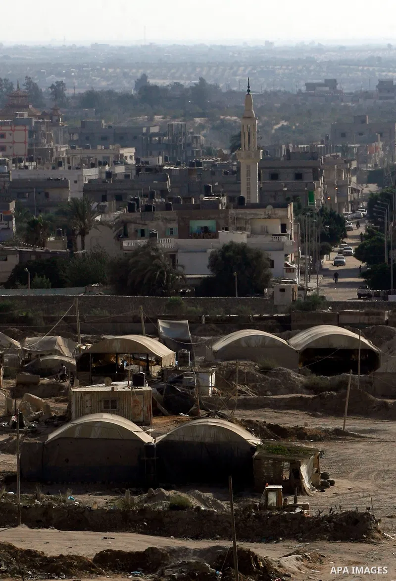 The entrances to smuggling tunnels are seen on the border between Egypt and the southern Gaza Strip, near Rafah August 13, 2012. Egypt began to seal off smuggling tunnels into the Gaza Strip, a security source said, two...