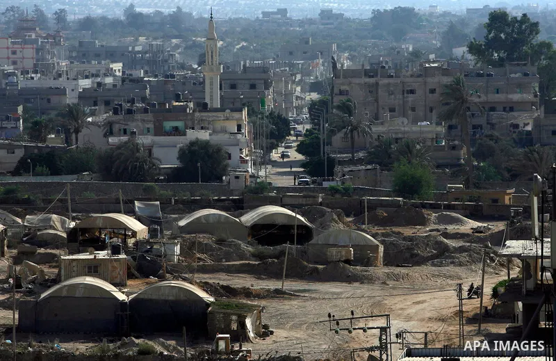 The entrances to smuggling tunnels are seen on the border between Egypt and the southern Gaza Strip, near Rafah August 13, 2012. Egypt began to seal off smuggling tunnels into the Gaza Strip, a security source said, two...