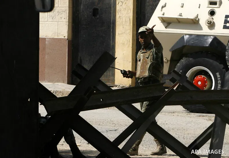 Egyptians soldier guard at Rafah border crossing between Egypt and southern Gaza Strip August 14, 2012. Egypt opened the crossing temporarily on Tuesday, but just for three days, mainly to permit travel for humanitarian...