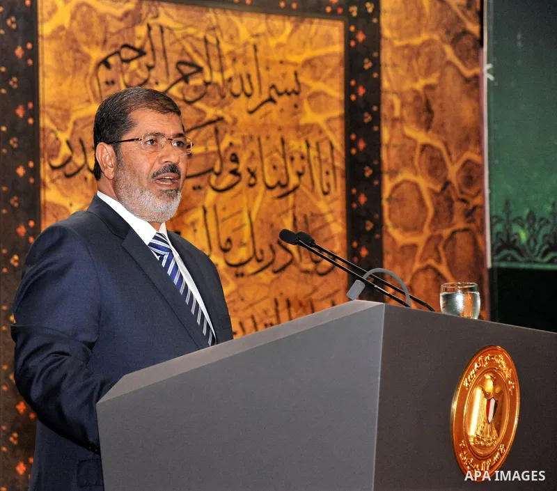 Egypt's President Mohamed Morsi speaks during the Laylat al-Qadr at Egypt Al-Azhar Conference Center in Nasr City in Cairo August 12, 2012. Mursi dismissed Cairo's two top generals and quashed a military order that had c...