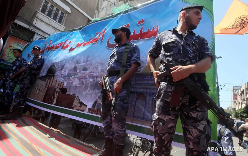 Palestinian policemen take part in an annual rally marking Al-Quds Day (Jerusalem Day) , on the last Friday of the holy month of Ramadan, in Gaza city, Friday, Aug. 17, 2012. Photo by Ashraf Amra