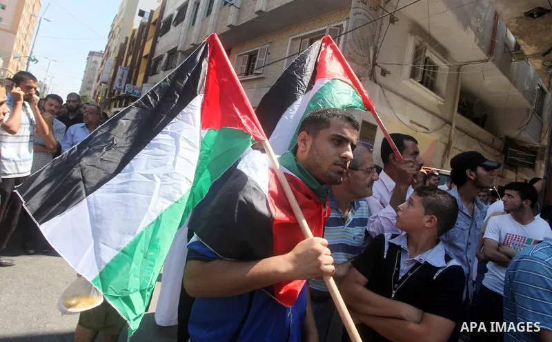 Palestinian demonstrators take part in an annual rally marking Al-Quds Day (Jerusalem Day) , on the last Friday of the holy month of Ramadan, in Gaza city, Friday, Aug. 17, 2012. Photo by Ashraf Amra