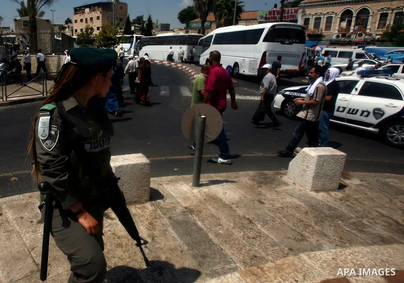 Israeli border policemen stand guard in front of the al-Aqsa mosque compound, Islam's third holiest site, on August 17, 2012, in the old city of Jerusalem, on the last Friday of the Muslim holy fasting month of Ramadan....