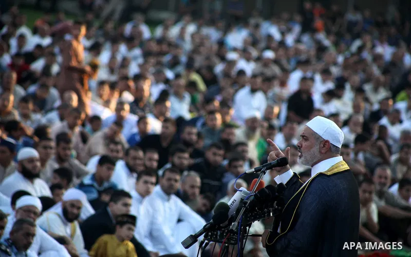 Palestinian Prime Minister in Gaza Strip, Ismail Haniyeh, gives a speech during Eid Al-Fitr prayers in Gaza City August 19, 2012. Eid al-Fitr marks the end of the Muslim holy month of Ramadan. Photo by Ashraf Amra