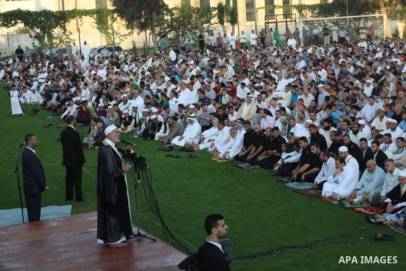 Palestinian Prime Minister in Gaza Strip, Ismail Haniyeh, gives a speech during Eid Al-Fitr prayers in Gaza City August 19, 2012. Eid al-Fitr marks the end of the Muslim holy month of Ramadan. Photo by Ashraf Amra
