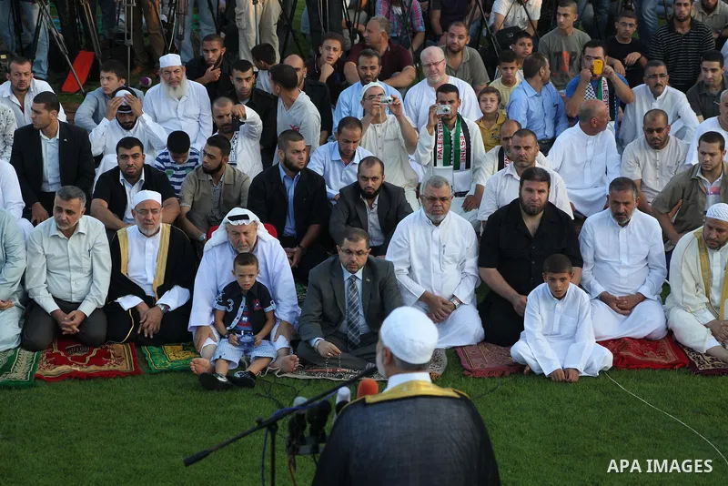 Palestinian Prime Minister in Gaza Strip, Ismail Haniyeh, gives a speech during Eid Al-Fitr prayers in Gaza City August 19, 2012. Eid al-Fitr marks the end of the Muslim holy month of Ramadan. Photo by Ashraf Amra