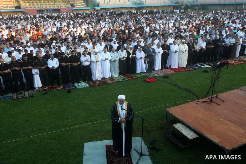 Palestinian Prime Minister in Gaza Strip, Ismail Haniyeh, gives a speech during Eid Al-Fitr prayers in Gaza City August 19, 2012. Eid al-Fitr marks the end of the Muslim holy month of Ramadan. Photo by Ashraf Amra