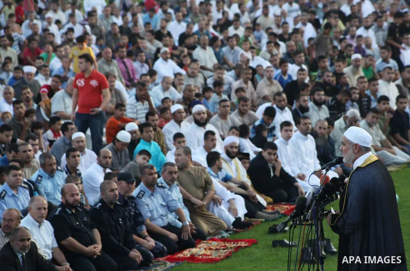 Palestinian Prime Minister in Gaza Strip, Ismail Haniyeh, gives a speech during Eid Al-Fitr prayers in Gaza City August 19, 2012. Eid al-Fitr marks the end of the Muslim holy month of Ramadan. Photo by Ashraf Amra