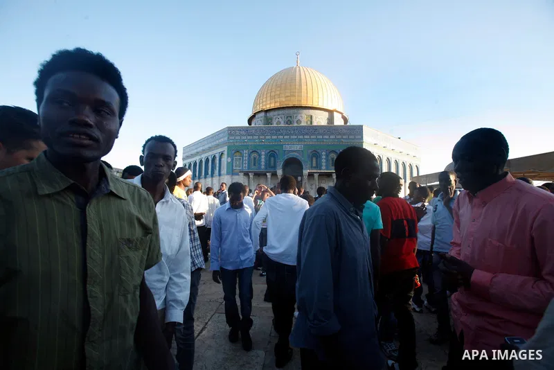 Muslims attend the Eid al-Fitr prayers at al-Aqsa mosque in Jerusalem's Old City, Sunday, Aug. 19, 2012. Muslims are celebrating the festival of Eid al-Fitr which marks the end of the holy fasting month of Ramadan. Photo...
