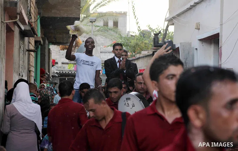 Palestinian friends and relatives celebrated the groom, Salah Khatab 25 years old, in ,Dear El-Balah, southern Gaza Strip on the eve of his wedding on August. 25, 2012, during the traditional celebration, Khatab was firs...