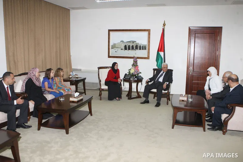 Palestinian President Mahmoud Abbas ( Abu Mazen ) meets with activist Nariman Tamimi and the girls Ahd and Marah Tamimi, in the West bank town of Ramallah, 26 August 2012. Photo by Thaer Ganaim