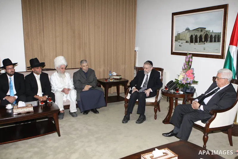 Palestinian President Mahmoud Abbas ( Abu Mazen ) meets with a delegation of Jewish clerics, in the West Bank city of Ramallah, on Aug 27, 2012. Photo by Thaer Ganaim