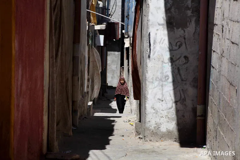 A Palestinian girl walks in an alley at Al-Shati refugee camp in Gaza City on August 28, 2012. Life in the poor and crowded Gaza Strip is going to get harsher still unless action is taken now, according to a new United N...