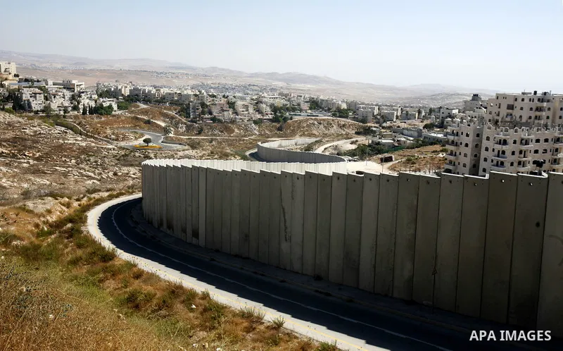 A part of Israel's separation barrier between Pisgat Ze'ev Jewish settlement and Shu'fat refugee camp near Jerusalem city on Aug 28,2012. Pisgat Ze'ev is situated east of Shuafat and Beit Hanina, west of Hizma, south of...