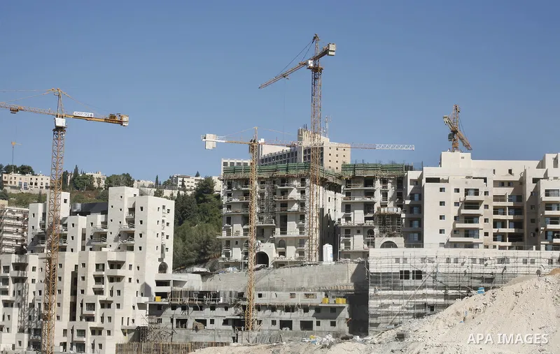 A general view of jewish settlement of Harmoun Hanatsave near the Arab neighbourhood of Ras al-Amud in Jerusalem on Aug 28,2012. Israeli government continue building Harmoun Hanatsave on the arab villages of Jabal al-Muk...
