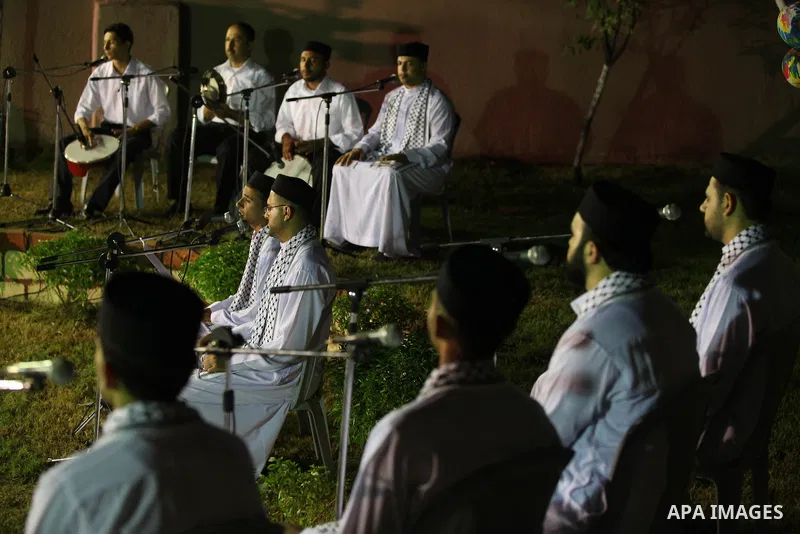 Palestinian Sufi artists performs the sufis songs during a celebration in Gaza city on Aug 28, 2012. Mystic songs symbolizing peace, brotherhood and love. Photo by Majdi Fathi