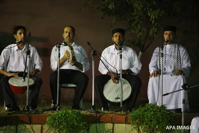 Palestinian Sufi artists performs the sufis songs during a celebration in Gaza city on Aug 28, 2012. Mystic songs symbolizing peace, brotherhood and love. Photo by Majdi Fathi