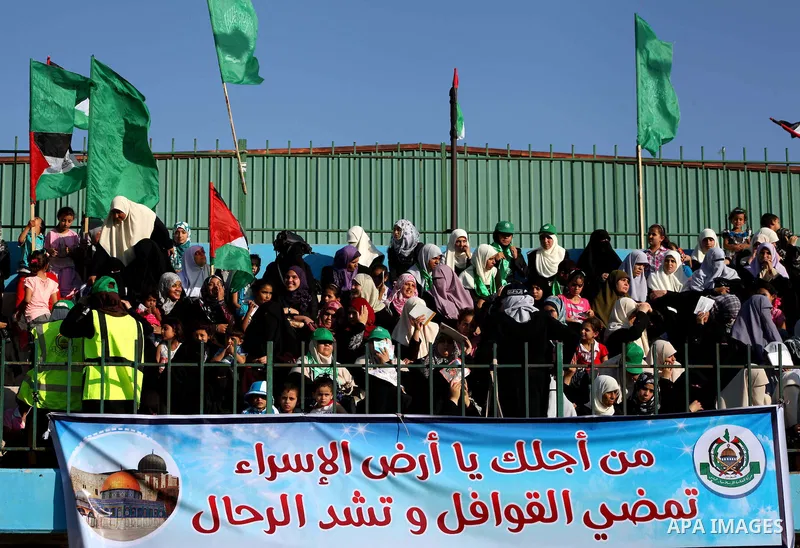 Palestinians attend a festival entitled "Jerusalem in our eyes" organized by Hamas movement, marking the 43rd anniversary of burning down al-Aqsa mosque in Gaza city on 30 Aug 2012. The Australian Jewish Dennis Michael R...