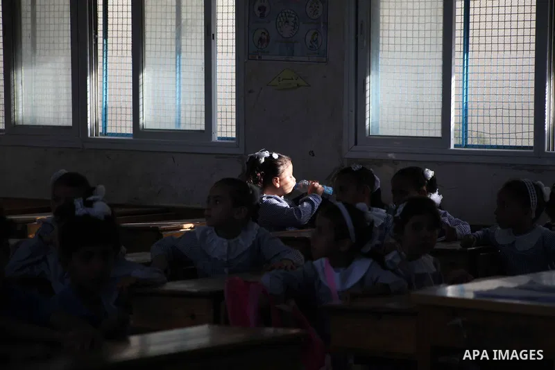 Palestinian students return back to their schools "UNRWA" in the morning of the first day of the new year study in Gaza city on Sep. 02, 2012. The academic year began in the Gaza Strip and West Bank on Sept. 02. Photo by...