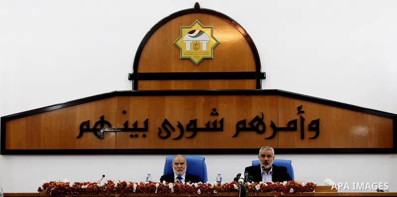 Ismail Haniya, the head of the Hamas government in the Gaza Strip, chairs a meeting members of the Palestinian Legislative Council in Gaza City on September 2, 2012. Haniya, announced a cabinet reshuffle, appointing seve...