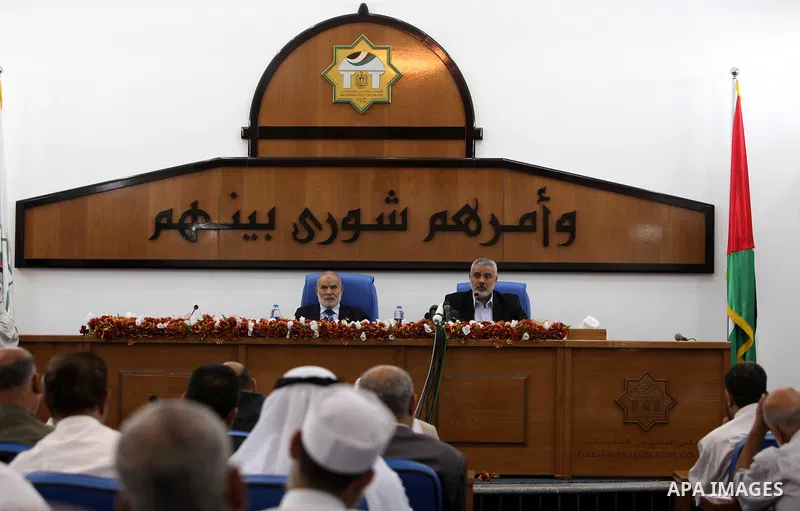 Ismail Haniya, the head of the Hamas government in the Gaza Strip, chairs a meeting members of the Palestinian Legislative Council in Gaza City on September 2, 2012. Haniya, announced a cabinet reshuffle, appointing seve...