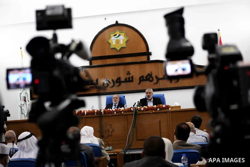 Ismail Haniya, the head of the Hamas government in the Gaza Strip, chairs a meeting members of the Palestinian Legislative Council in Gaza City on September 2, 2012. Haniya, announced a cabinet reshuffle, appointing seve...