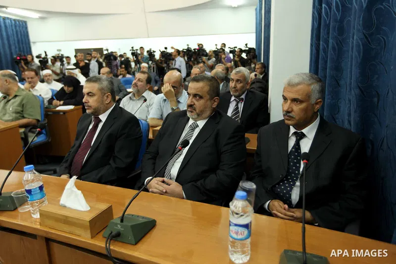 Ismail Haniya, the head of the Hamas government in the Gaza Strip, chairs a meeting members of the Palestinian Legislative Council in Gaza City on September 2, 2012. Haniya, announced a cabinet reshuffle, appointing seve...
