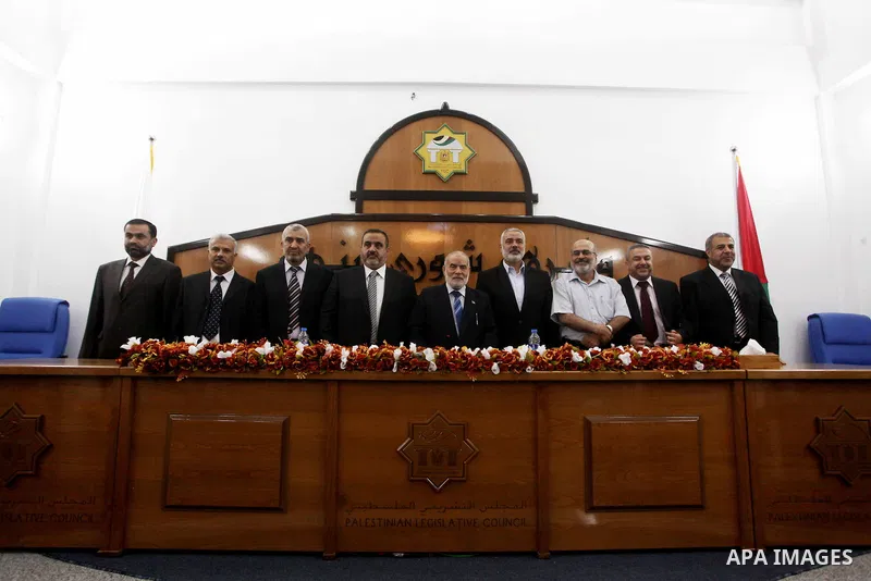 Ismail Haniya, the head of the Hamas government in the Gaza Strip, chairs a meeting members of the Palestinian Legislative Council in Gaza City on September 2, 2012. Haniya, announced a cabinet reshuffle, appointing seve...