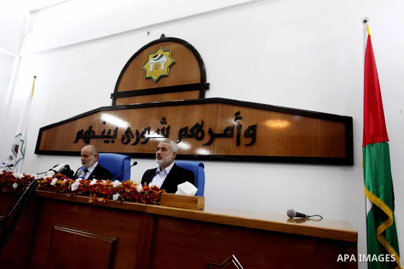 Ismail Haniya, the head of the Hamas government in the Gaza Strip, chairs a meeting members of the Palestinian Legislative Council in Gaza City on September 2, 2012. Haniya, announced a cabinet reshuffle, appointing seve...