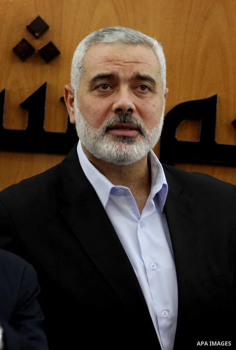 Ismail Haniya, the head of the Hamas government in the Gaza Strip, chairs a meeting members of the Palestinian Legislative Council in Gaza City on September 2, 2012. Haniya, announced a cabinet reshuffle, appointing seve...