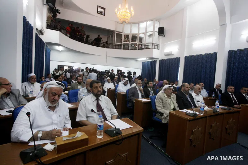 Ismail Haniya, the head of the Hamas government in the Gaza Strip, chairs a meeting members of the Palestinian Legislative Council in Gaza City on September 2, 2012. Haniya, announced a cabinet reshuffle, appointing seve...