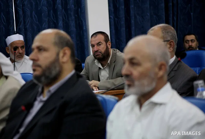 Ismail Haniya, the head of the Hamas government in the Gaza Strip, chairs a meeting members of the Palestinian Legislative Council in Gaza City on September 2, 2012. Haniya, announced a cabinet reshuffle, appointing seve...