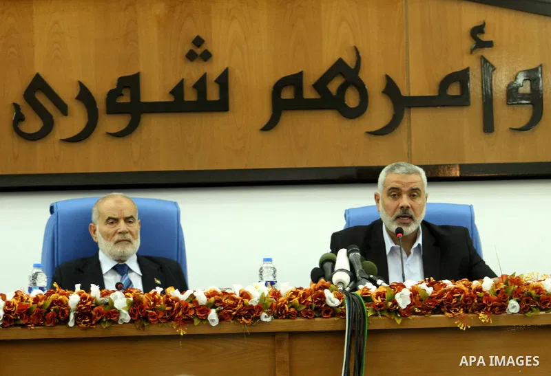 Ismail Haniya, the head of the Hamas government in the Gaza Strip, chairs a meeting members of the Palestinian Legislative Council in Gaza City on September 2, 2012. Haniya, announced a cabinet reshuffle, appointing seve...