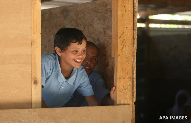 Palestinian students at their school during the visit of Palestinian Prime Minister Salam Fayyad to the "al-Khan al-Ahmar" school, on the first day of the new school year, in Abu Hindi valley in the bedouin, in occupied...