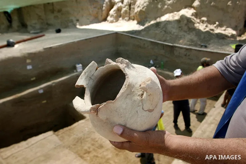 Palestinian workers do excavation in a new discovered archeological site dating back to the Iron-Age period in Rafah, southern Gaza Strip, on Aug. 30, 2012. Photo by Eyad Al Baba