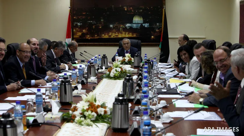 Palestinian Prime Minister, Salam Fayyad meets with member of the Palestinian government, in the West Bank city of Ramallah, on Sep. 04, 2102. Photo by Mustafa Abu Dayeh